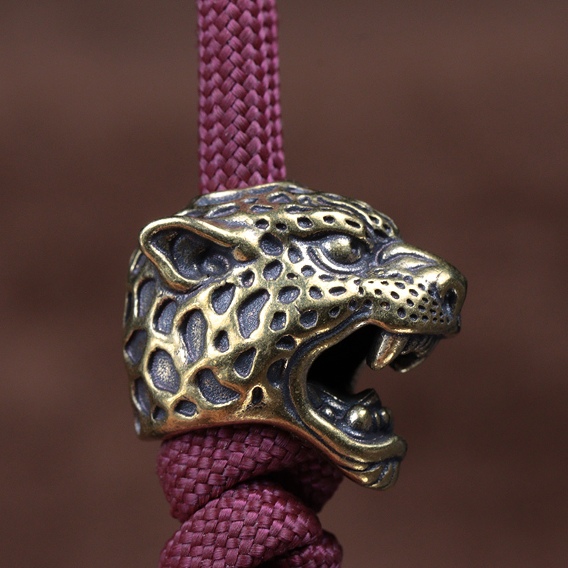 Leopard cabeça escultura, bron - Paracord Survival Bracelet avaliação e preço